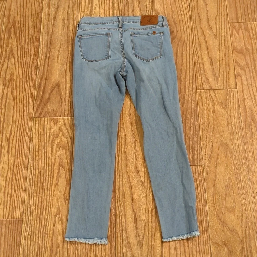 Light wash distressed skinny ankle jeans w/ stretch & raw hem, Angry Rabbit 28" - Picture 5 of 7